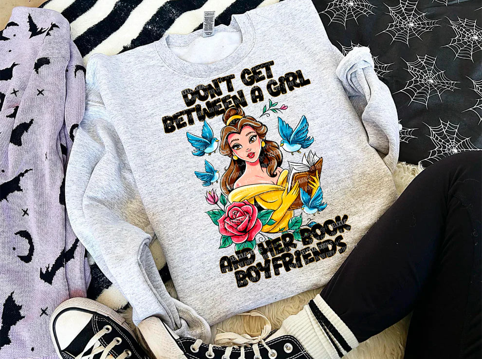 Don't Get Between A Girl And A Good Book